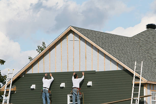 Professional Siding Contractor technician working in Cambridge City, IN